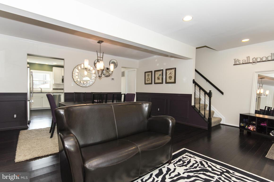 15 Robin Ridge Court Baltimore, MD 21234 - Photo 3 of 30 a living room with furniture and a chandelier