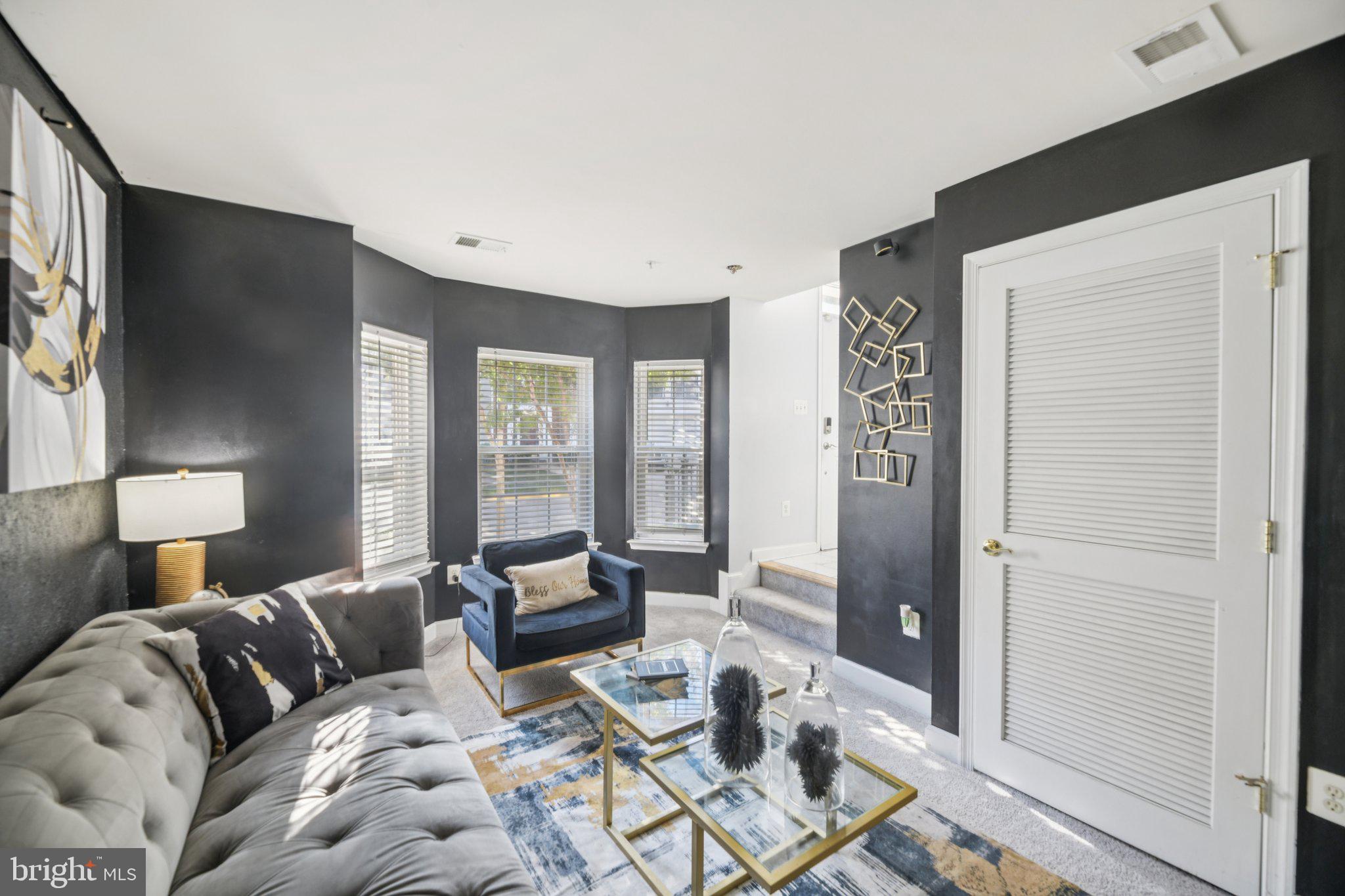4334 Talmadge Circle Suitland, MD 20746 - Photo 2 of 29 a living room with furniture and a large window