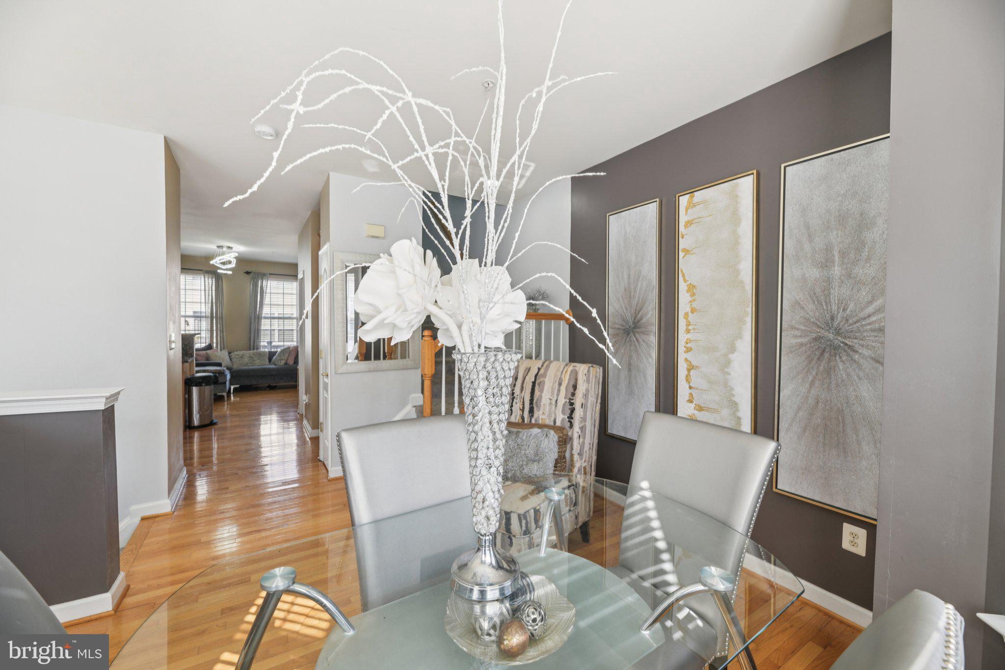 4334 Talmadge Circle Suitland, MD 20746 - Photo 8 of 29 a view of a livingroom with furniture wooden floor and a chandelier