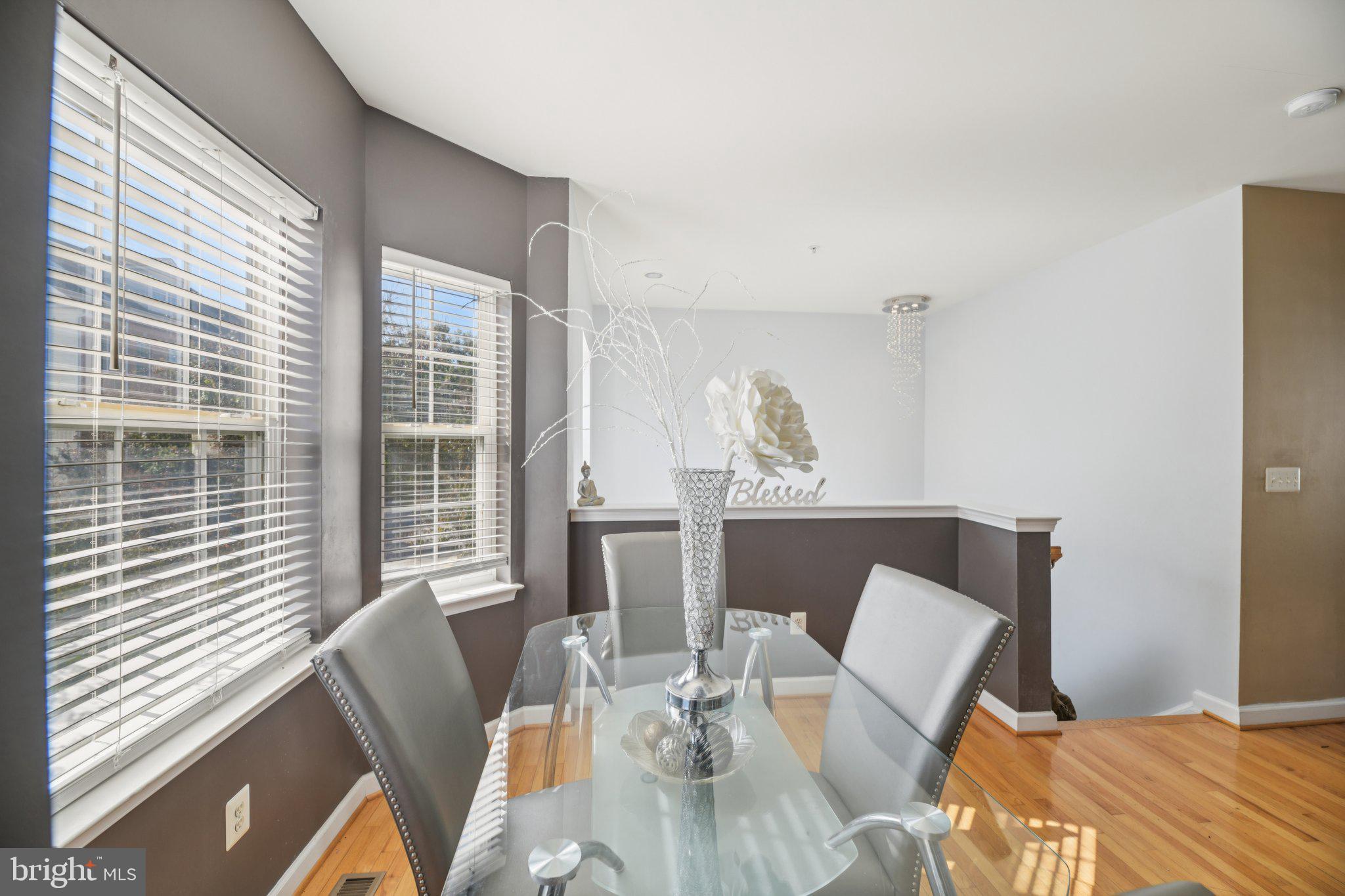 4334 Talmadge Circle Suitland, MD 20746 - Photo 9 of 29 a view of a dining room with furniture windows and wooden floor