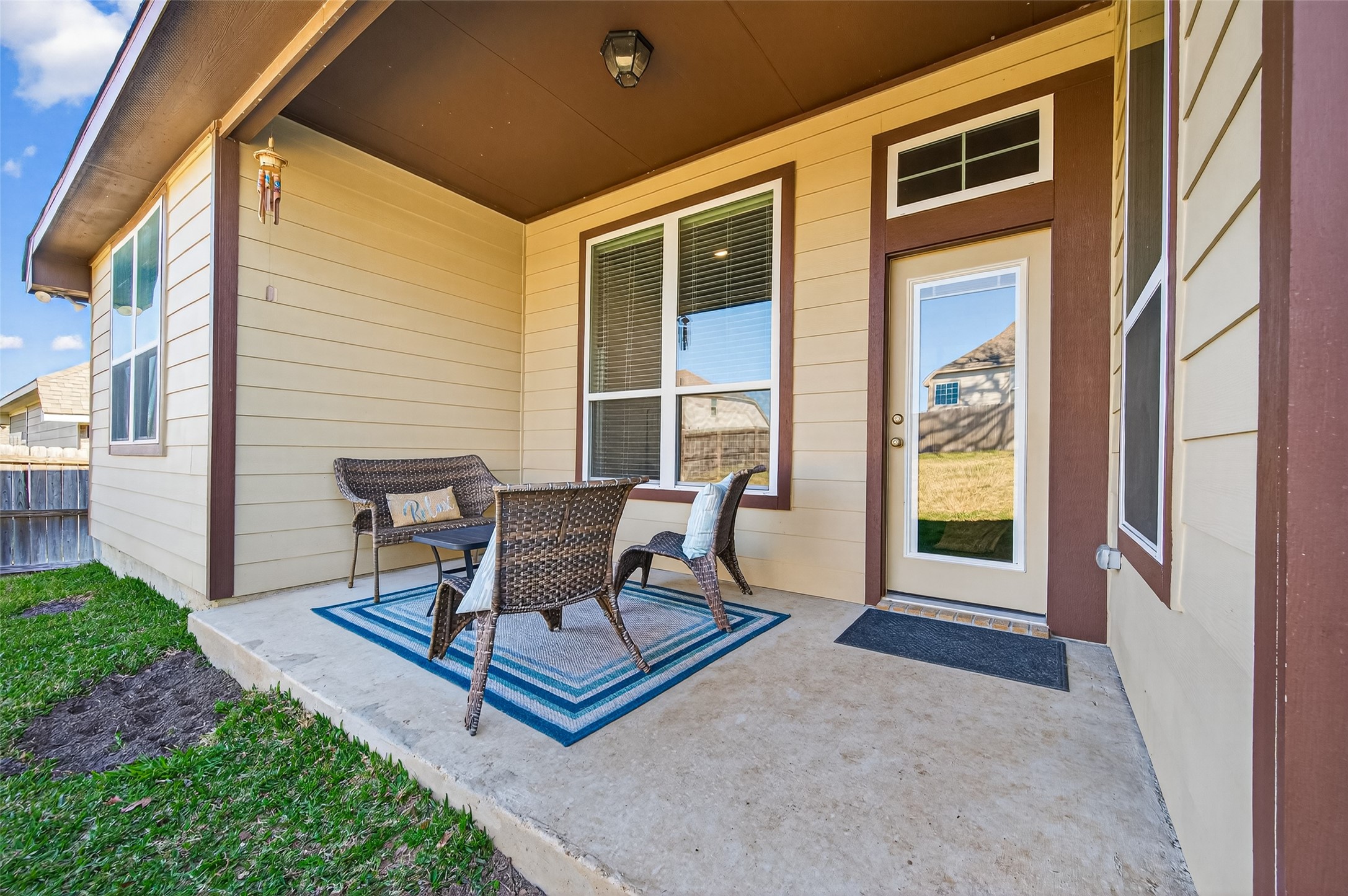 917 Farm Path Brenham, TX 77833 - Photo 37 of 43 a wooden bench sitting in front of a building