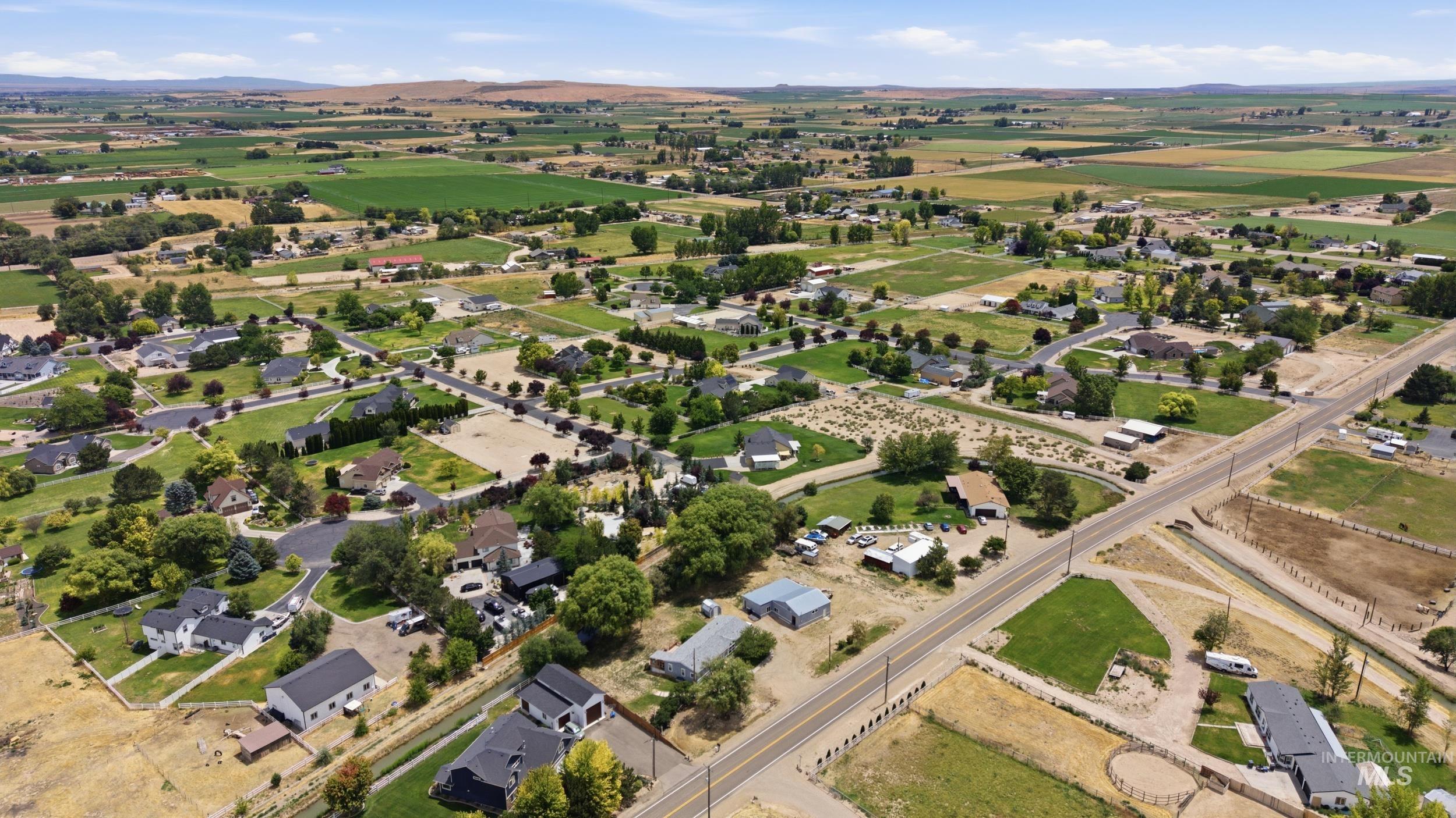 7422 Track Road Nampa, ID 83686 - Photo 44 of 50 Expansive aerial view of a rural landscape with scattered residential properties