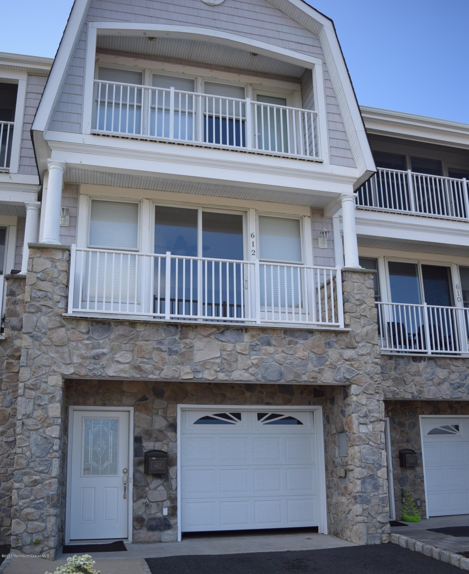 612 Front Street, Unit 7 Union Beach, NJ 07735 - Photo 1 of 15 a view of a house with a window