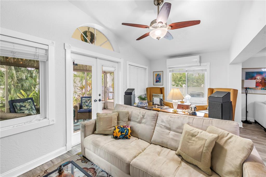 2856 65th Way North St. Petersburg, FL 33710 - Photo 13 of 49 a living room with furniture ceiling fan and a window