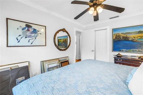 a bed room with a bed and a window