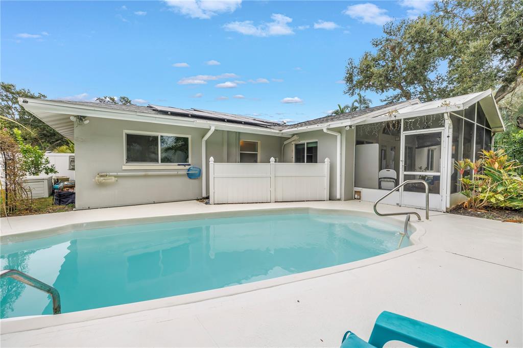 2856 65th Way North St. Petersburg, FL 33710 - Photo 39 of 49 a front view of house with yard and seating space