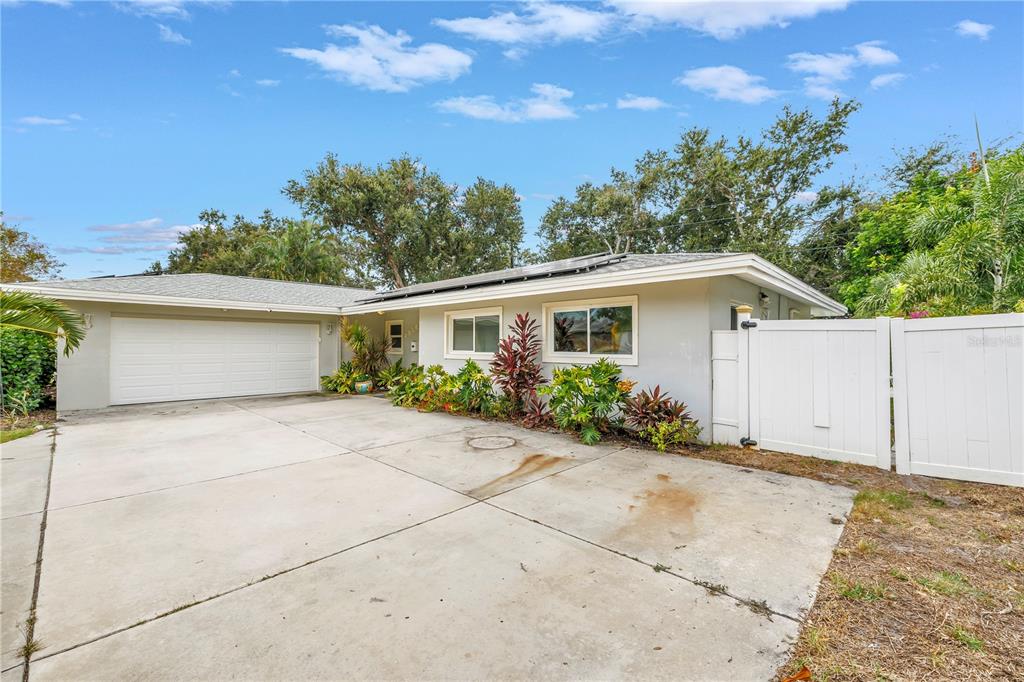 2856 65th Way North St. Petersburg, FL 33710 - Photo 47 of 49 front view of a house with a yard