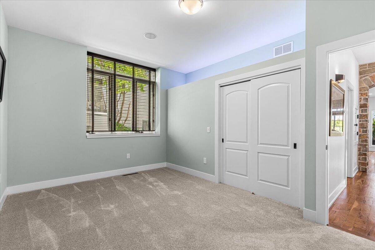 4763 Fontana Beach Road, Unit 4762 Polk, WI 53086 - Photo 31 of 100 Main Level Bedroom #2