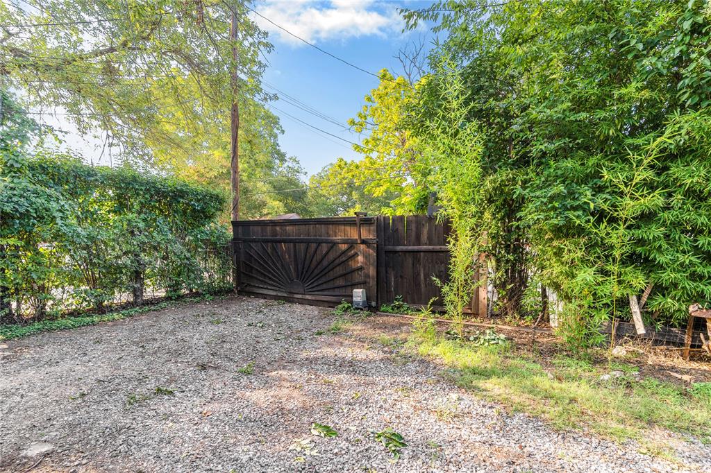 548 Elston Drive Dallas, TX 75232 - Photo 17 of 21 a view of backyard with tree