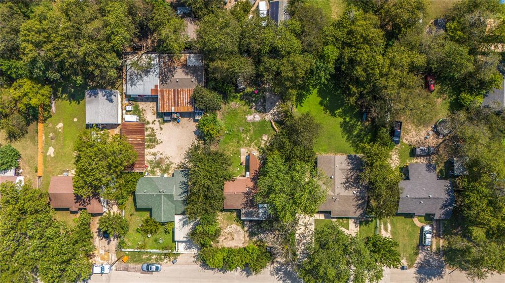 548 Elston Drive Dallas, TX 75232 - Photo 18 of 21 an aerial view of residential houses with outdoor space and trees
