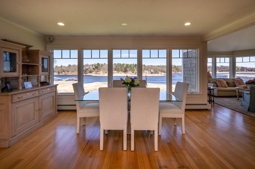 33 Stanton Road Cohasset, MA 02025 - Photo 15 of 40 a view of a dining room with furniture window and wooden floor