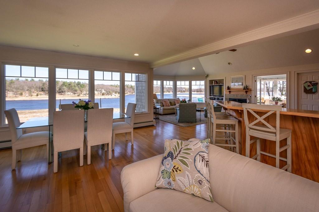 33 Stanton Road Cohasset, MA 02025 - Photo 17 of 40 a living room with furniture and a table
