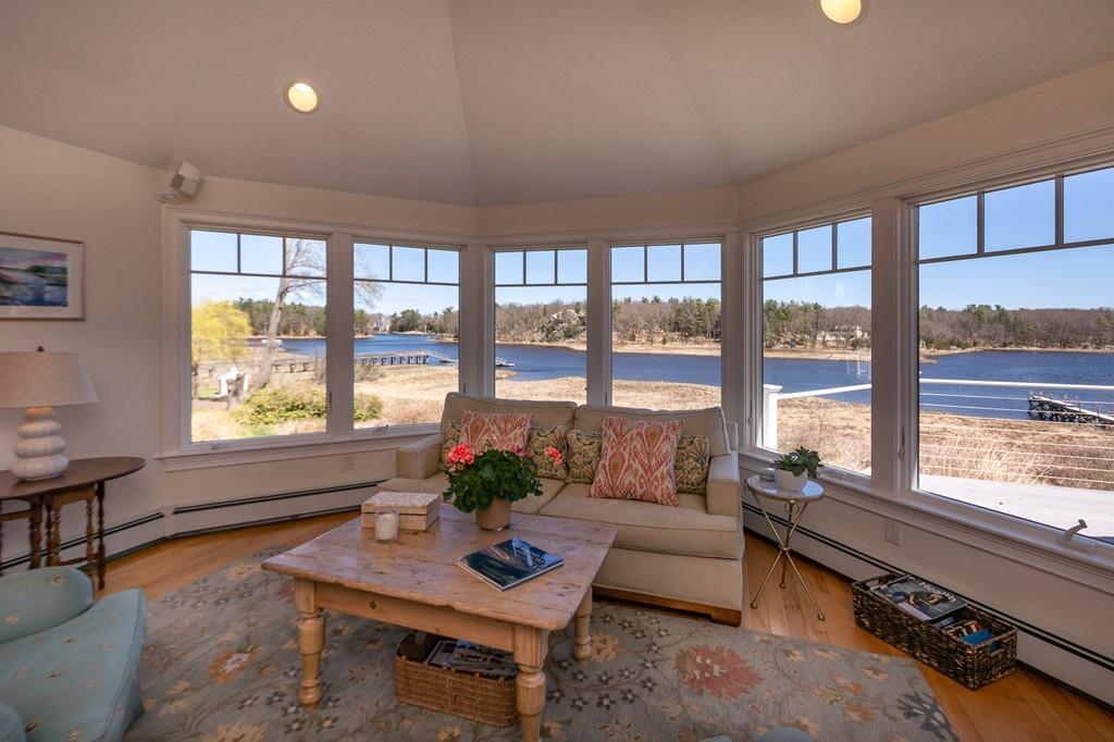 33 Stanton Road Cohasset, MA 02025 - Photo 19 of 40 a living room with furniture and a large window