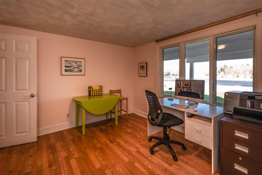 33 Stanton Road Cohasset, MA 02025 - Photo 37 of 40 a view of a workspace with furniture and a window