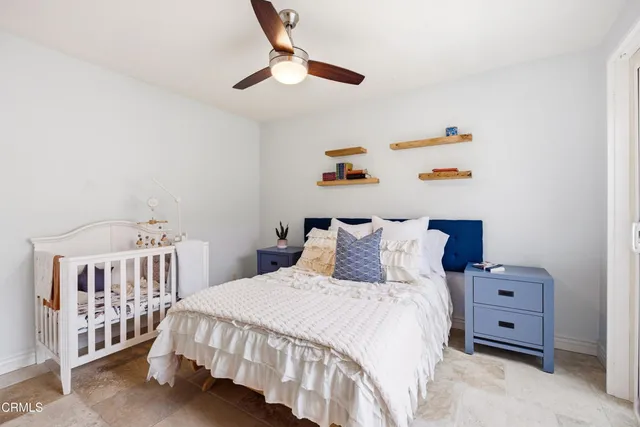 a view of a swimming pool and lounge chair