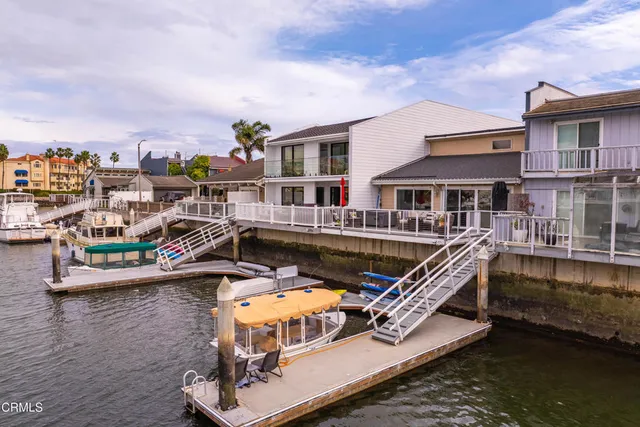 a view of a swimming pool with outdoor seating
