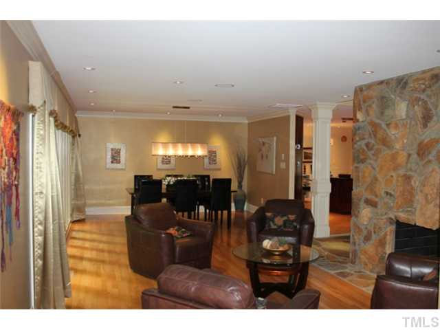 2304 Valley Forge Road, Unit LT34 Raleigh, NC 27615 - Photo 7 of 25 Double Sided Fireplace, Hardwood Flooring, Dining Area Living Room