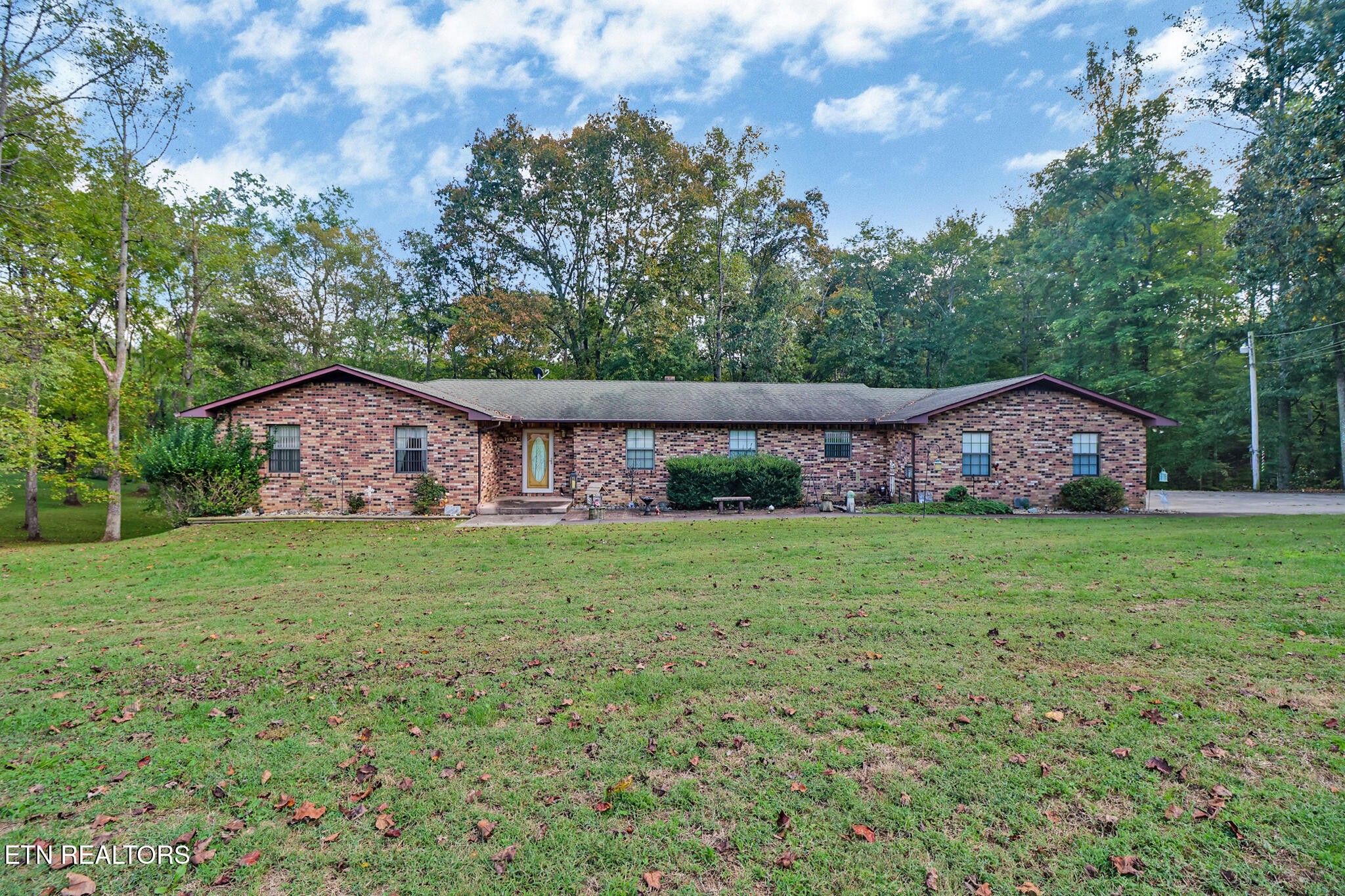 1190 Sand Cut Road Oneida, TN 37841 - Photo 2 of 41 a view of a house with backyard and garden