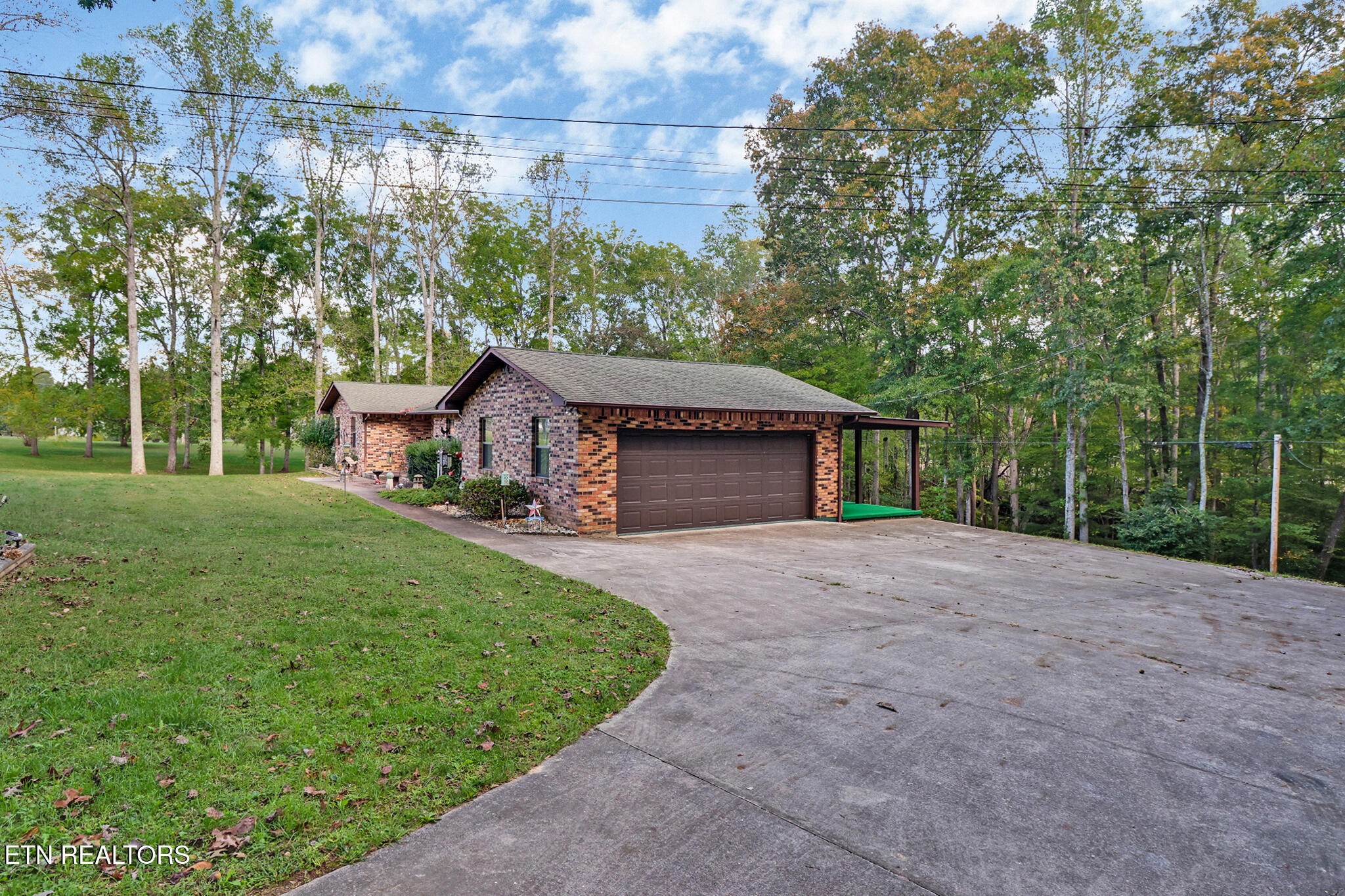 1190 Sand Cut Road Oneida, TN 37841 - Photo 3 of 41 a house view with a garden space