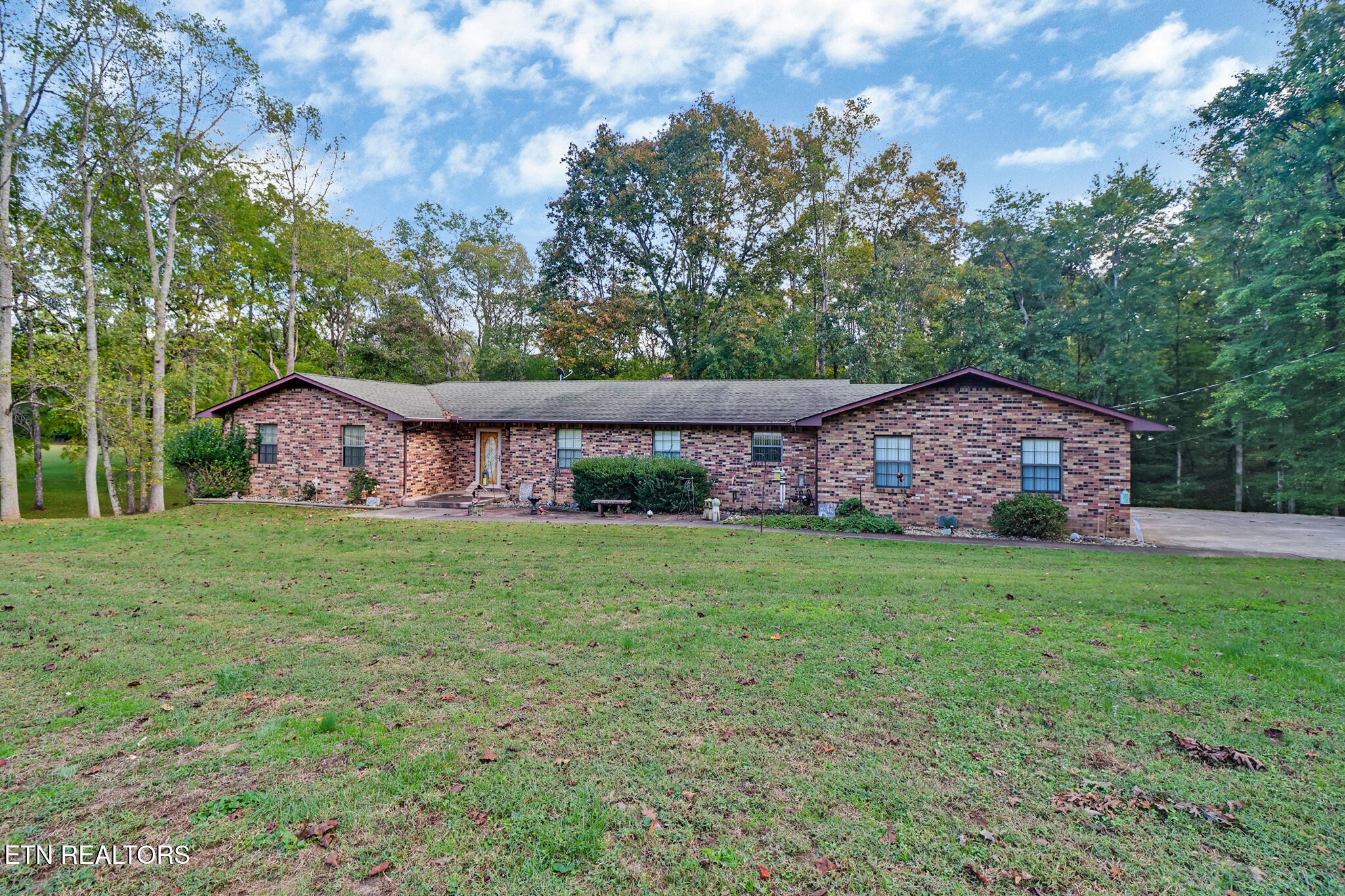 1190 Sand Cut Road Oneida, TN 37841 - Photo 35 of 41 a view of a couches in backyard of house