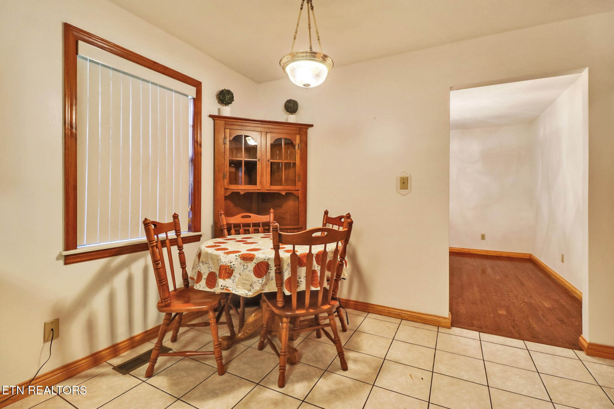 1190 Sand Cut Road Oneida, TN 37841 - Photo 7 of 41 a view of a dining room with furniture and chandelier