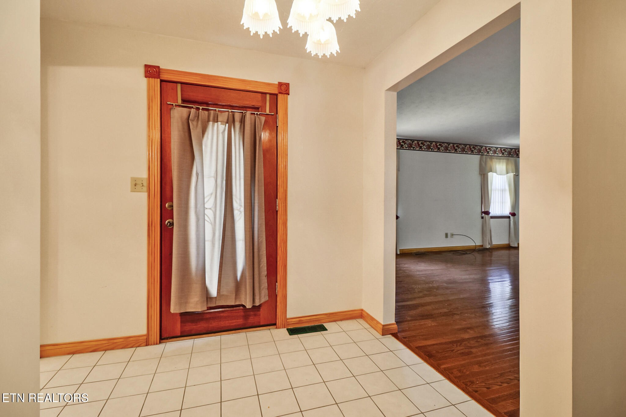 1190 Sand Cut Road Oneida, TN 37841 - Photo 8 of 41 a view of a hallway with wooden floor