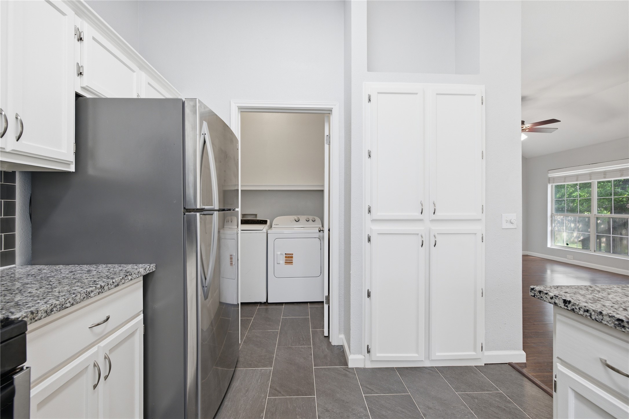 2922 Wickersham Lane Austin, TX 78741 - Photo 19 of 26 a kitchen with a refrigerator and countertop