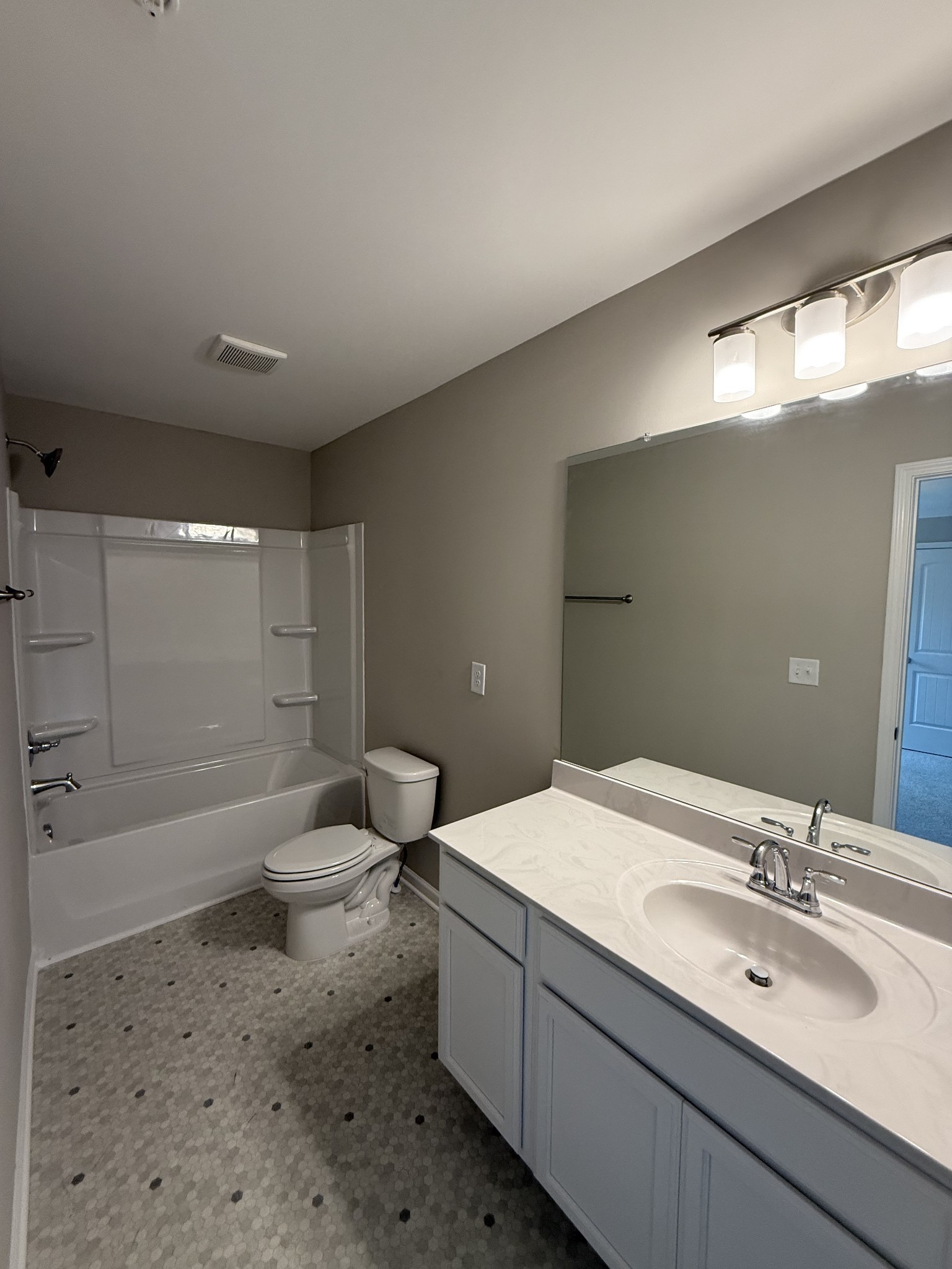 316 Selesia Lane Pleasant View, TN 37146 - Photo 13 of 16 a bathroom with a sink toilet and shower