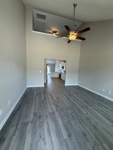 a view of a livingroom with a hardwood floor