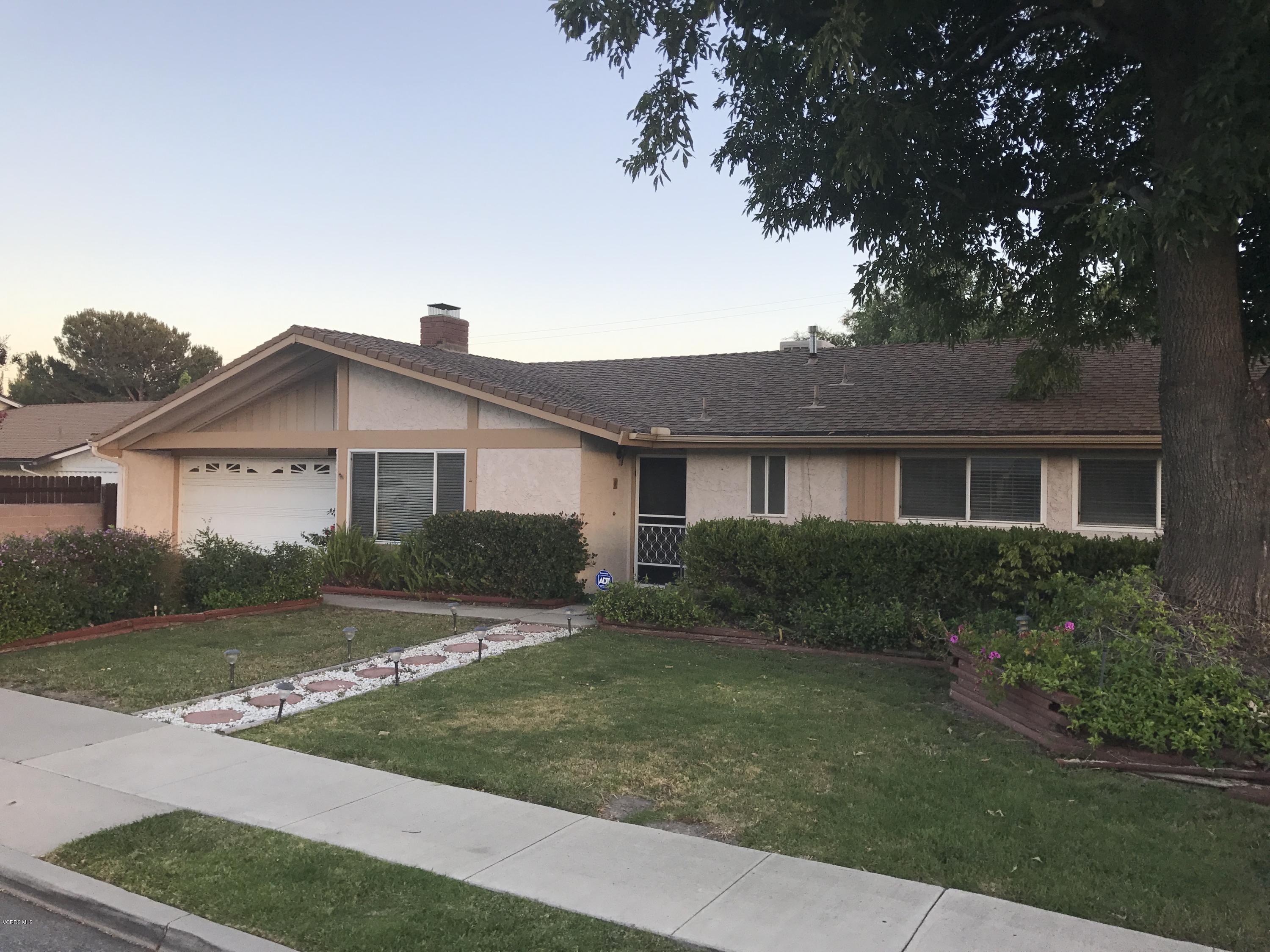 3920 Russ Court Simi Valley, CA 93063 - Photo 1 of 32 a front view of a house with a yard
