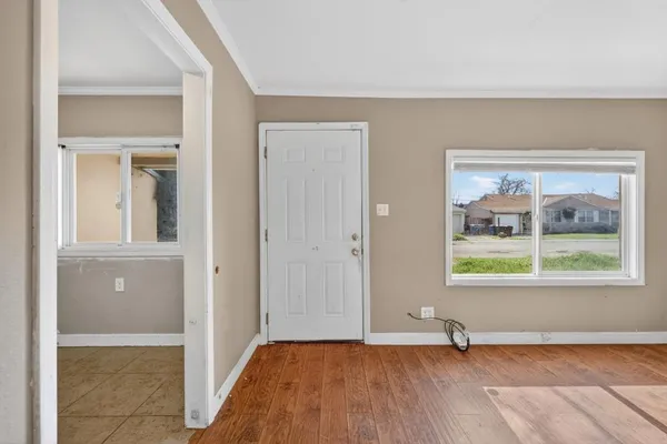 an empty room that has a window