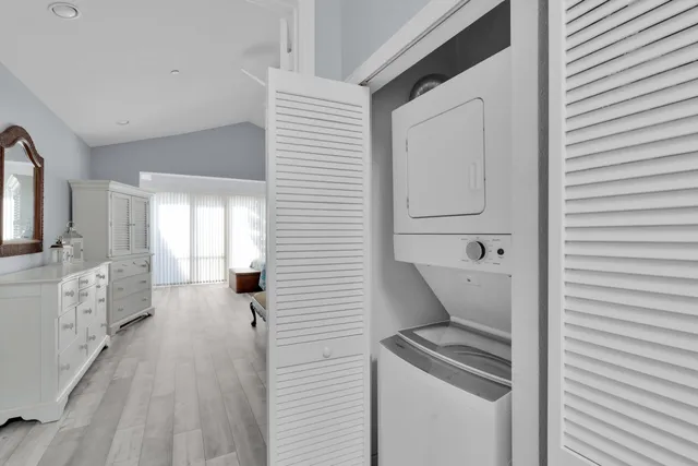 a kitchen with a refrigerator a sink and dishwasher