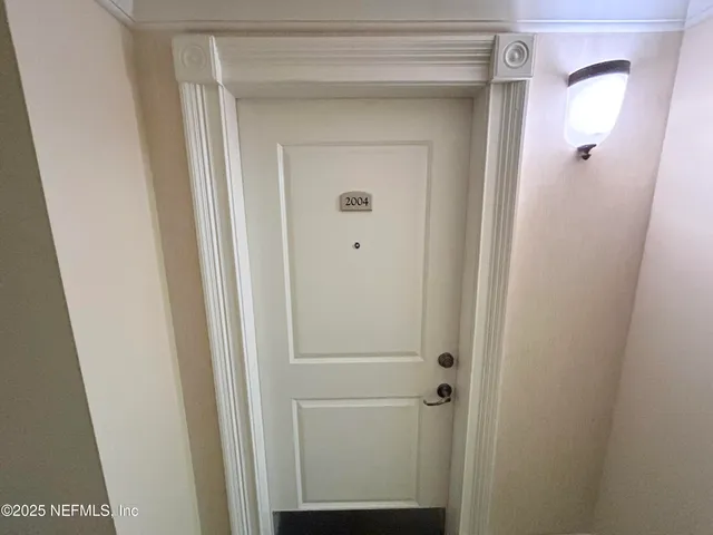 a living room with furniture fireplace and flat screen tv
