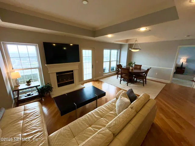 a living room with furniture and a table