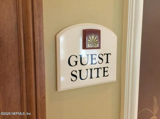 a living room with fireplace furniture and a flat screen tv