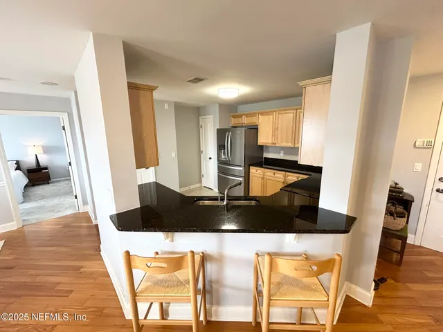 a view of a workspace with furniture