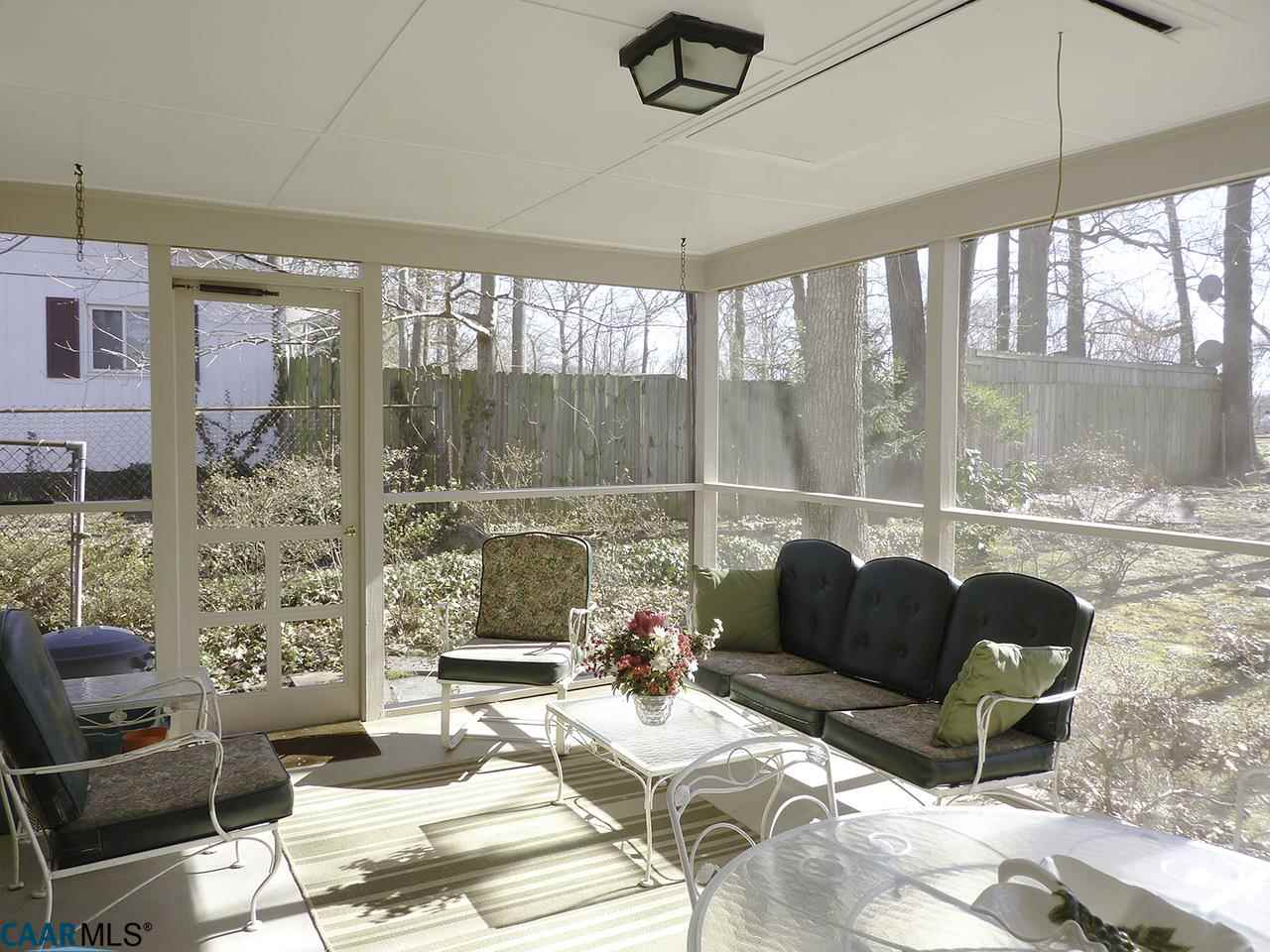 606 Shamrock Road Charlottesville, VA 22903 - Photo 6 of 19 a living room with furniture and a floor to ceiling window