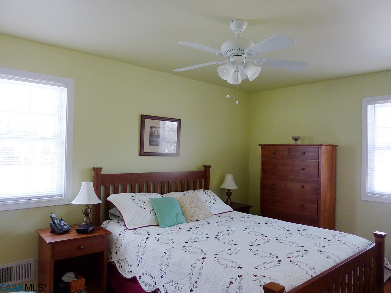 606 Shamrock Road Charlottesville, VA 22903 - Photo 7 of 19 a bedroom with a bed and a dresser