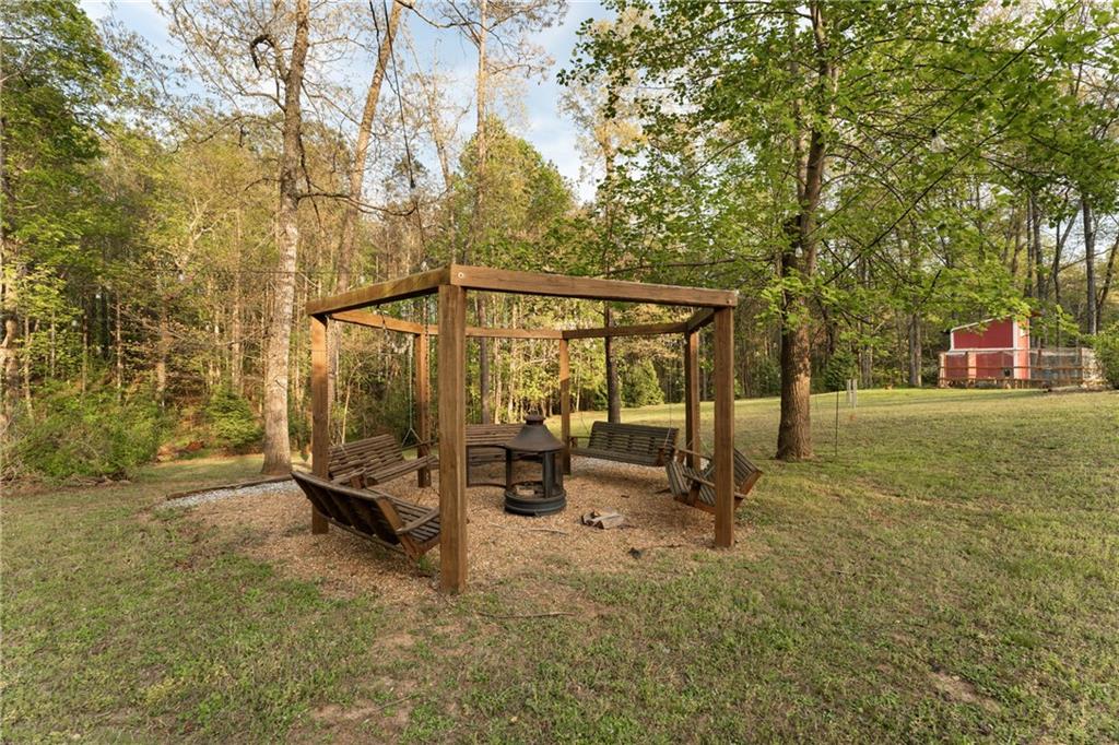 402 Hunters Court Ball Ground, GA 30107 - Photo 34 of 56 a view of outdoor space with seating area