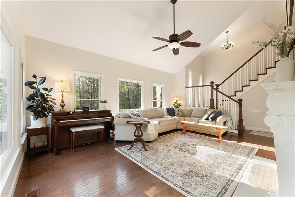 402 Hunters Court Ball Ground, GA 30107 - Photo 4 of 56 a living room with furniture and a rug