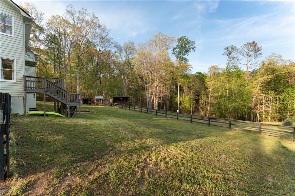 402 Hunters Court Ball Ground, GA 30107 - Photo 41 of 56 a view of a park with large trees