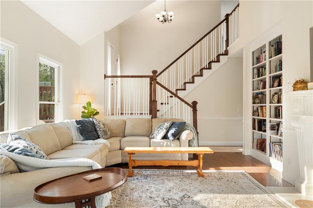 402 Hunters Court Ball Ground, GA 30107 - Photo 5 of 56 a living room with furniture and a rug