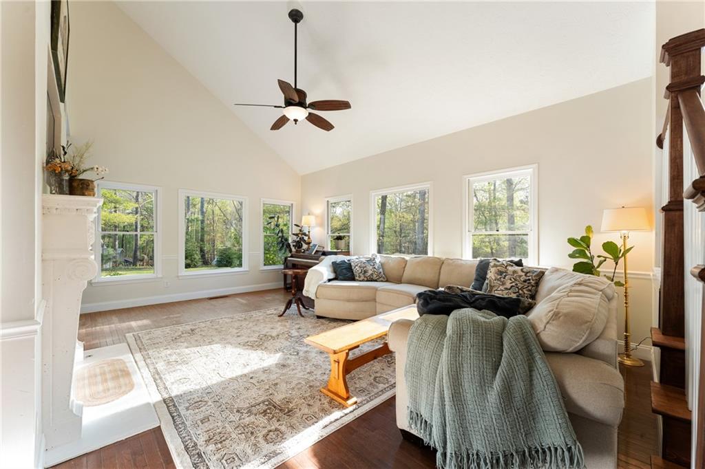 402 Hunters Court Ball Ground, GA 30107 - Photo 9 of 56 a living room with furniture and a window