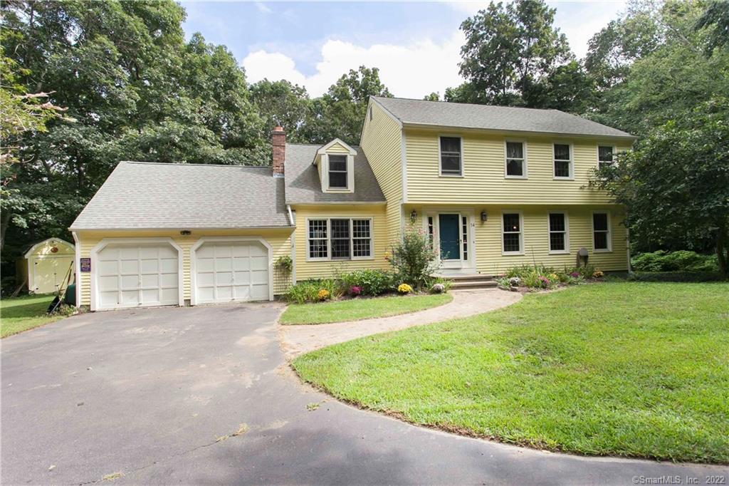 front view of a house with a patio