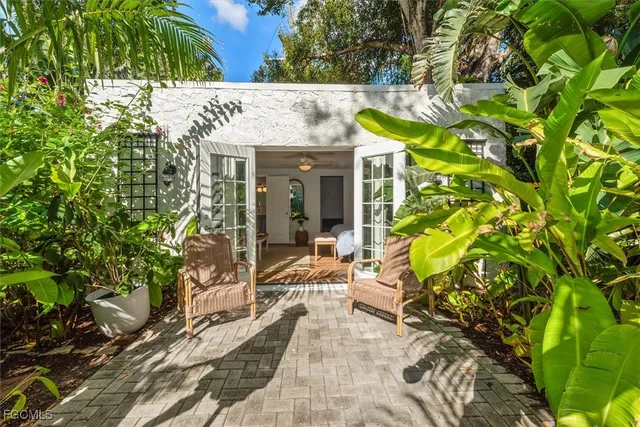a view of house with patio outdoor seating