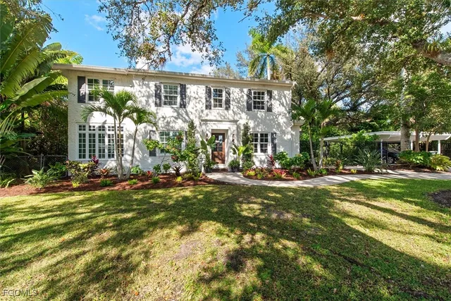 a view of a house with a swimming pool