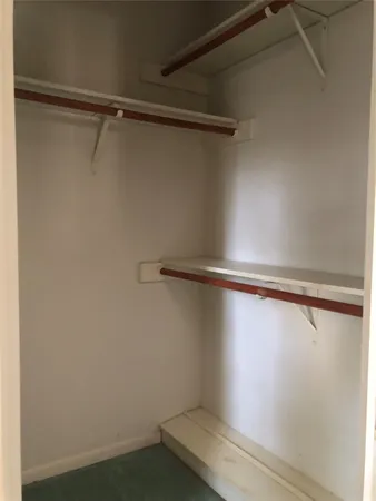 a view of a room with racks on the wall