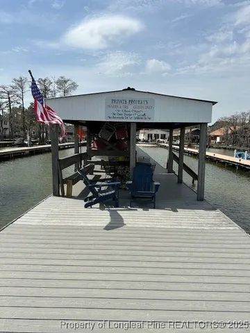 a kitchen with appliances cabinets and a sink