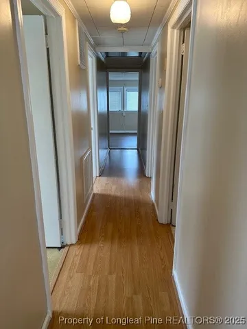 a bathroom with a toilet a sink and bathtub