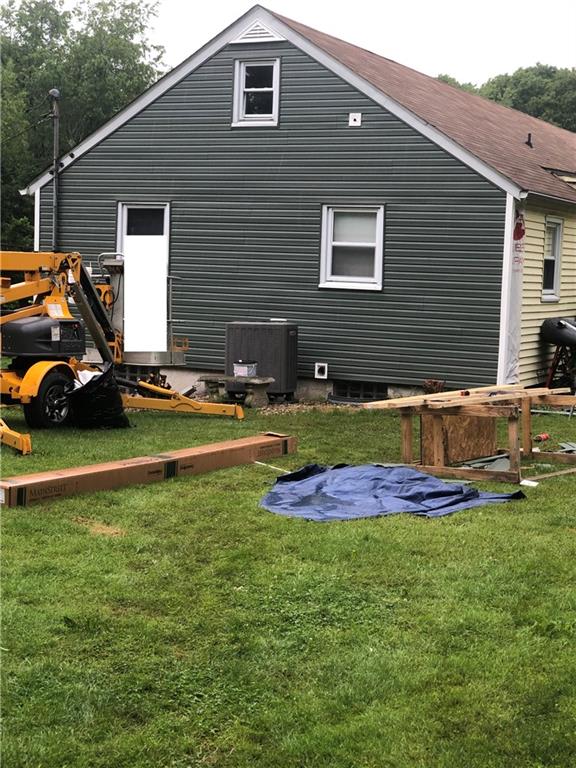 989 Blackhawk Road Beaver Falls, PA 15010 - Photo 15 of 18 a front view of house with yard and trees